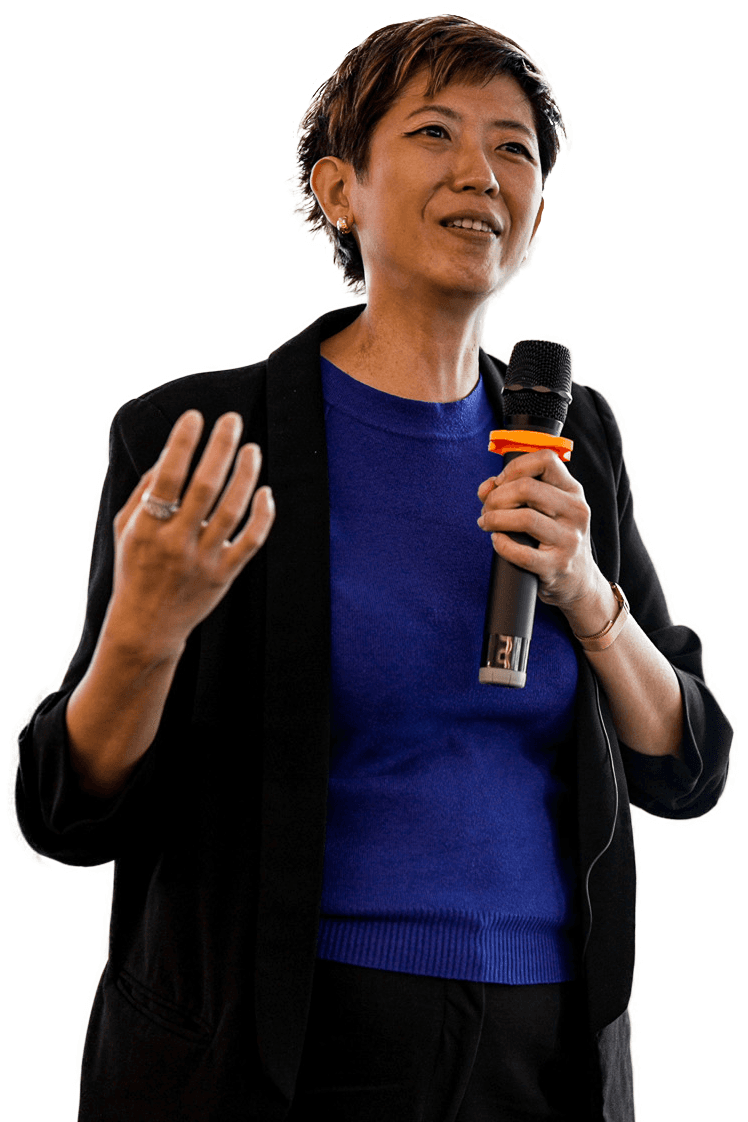 A woman speaking into a microphone
