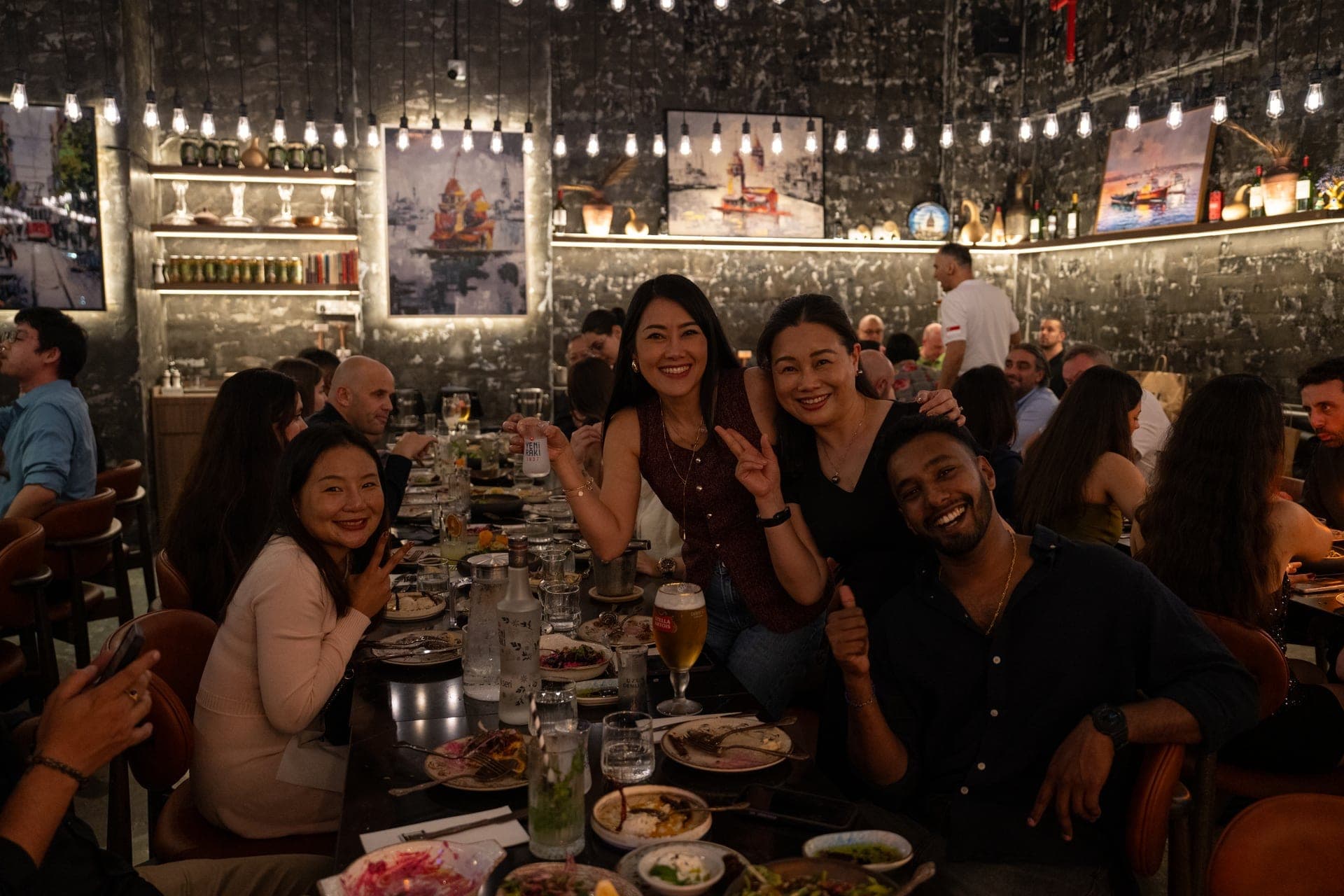 Colleagues sharing a private dinner at Pera