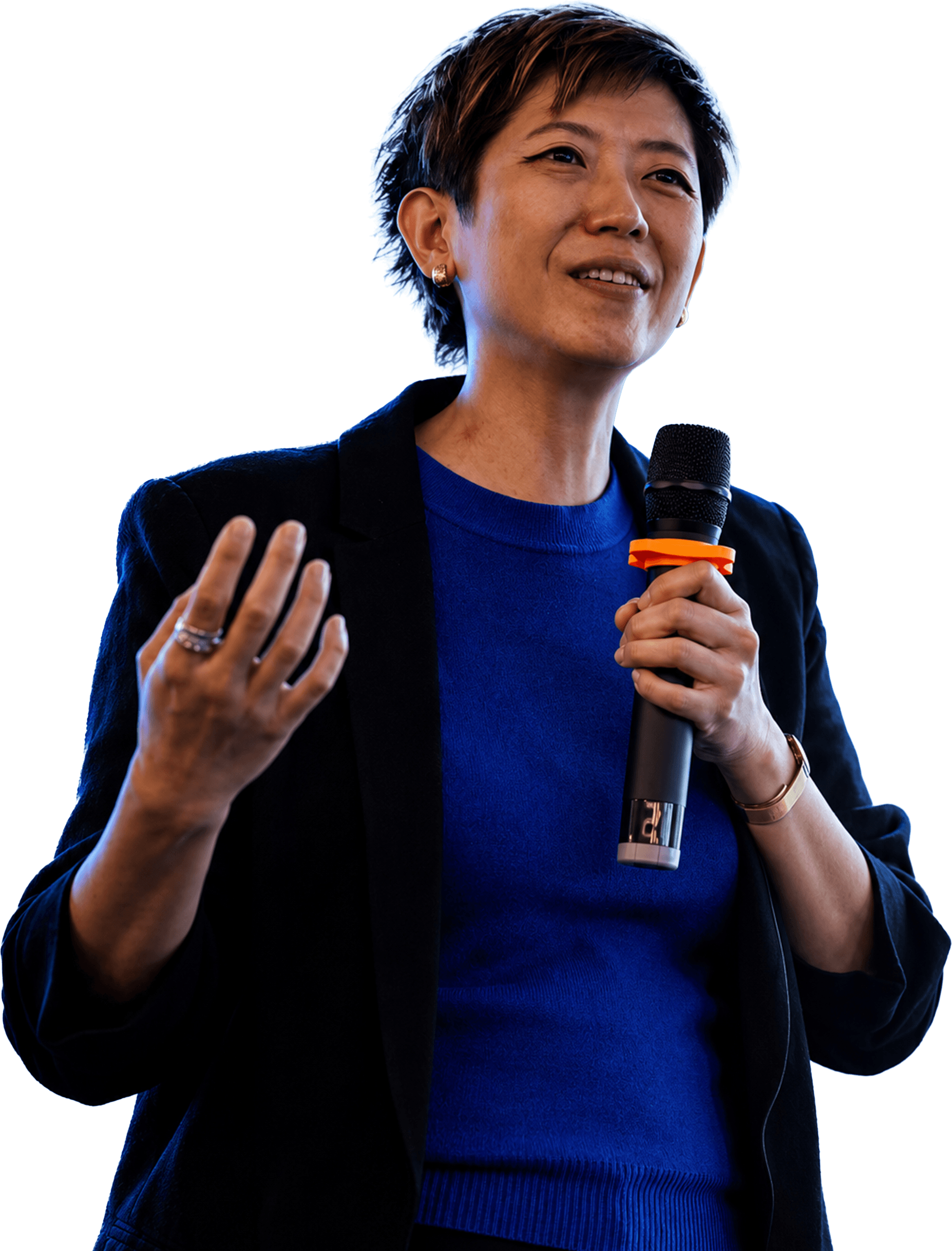 A woman speaking into a microphone