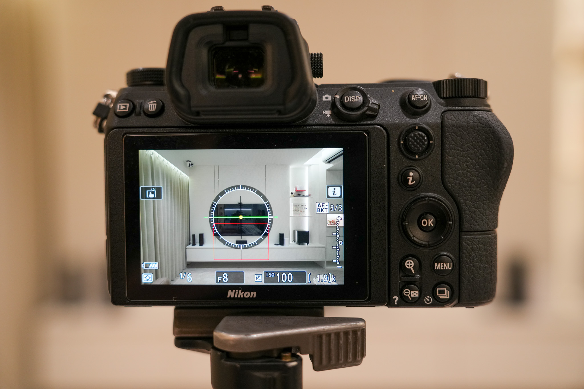 A Lumida Studios camera monitor showing a levelled interior frame