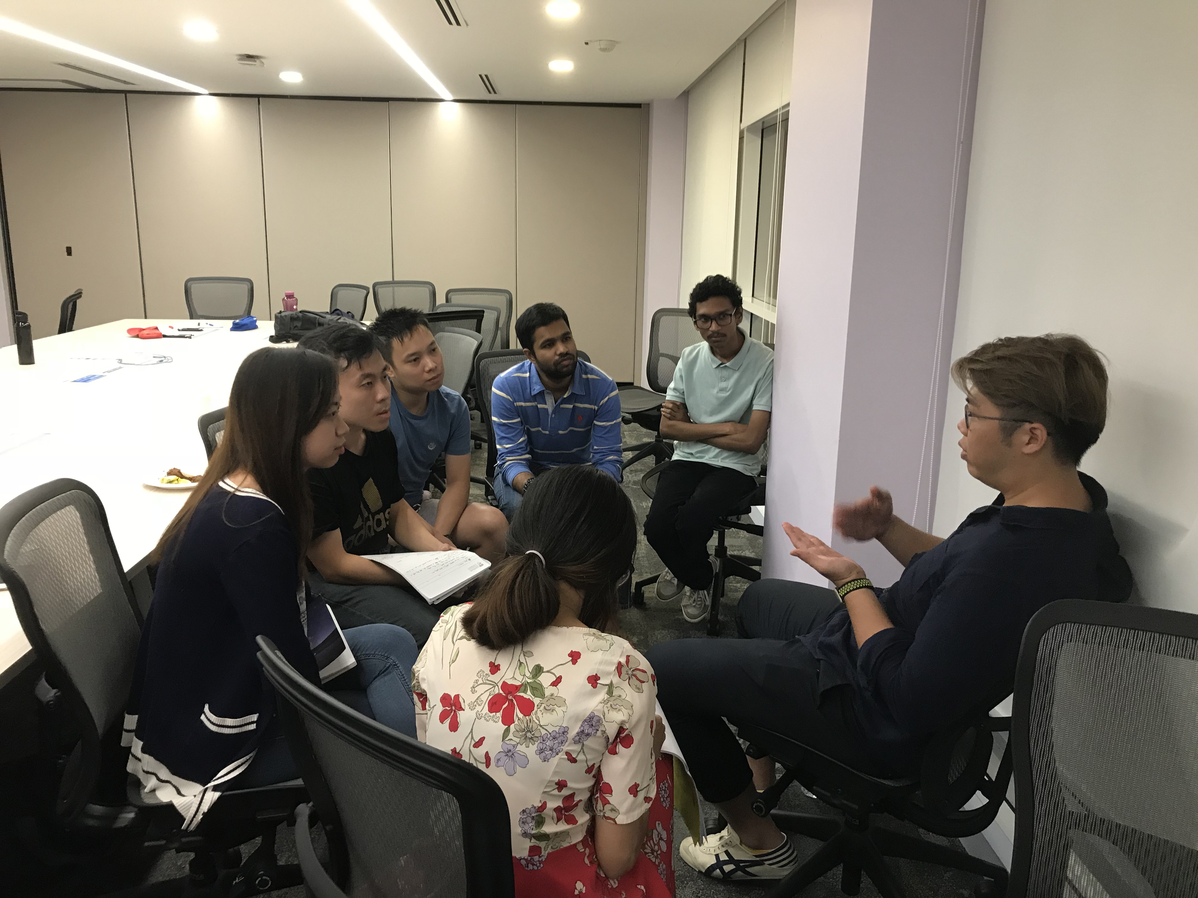 Small-group mentoring conversation with NTU students