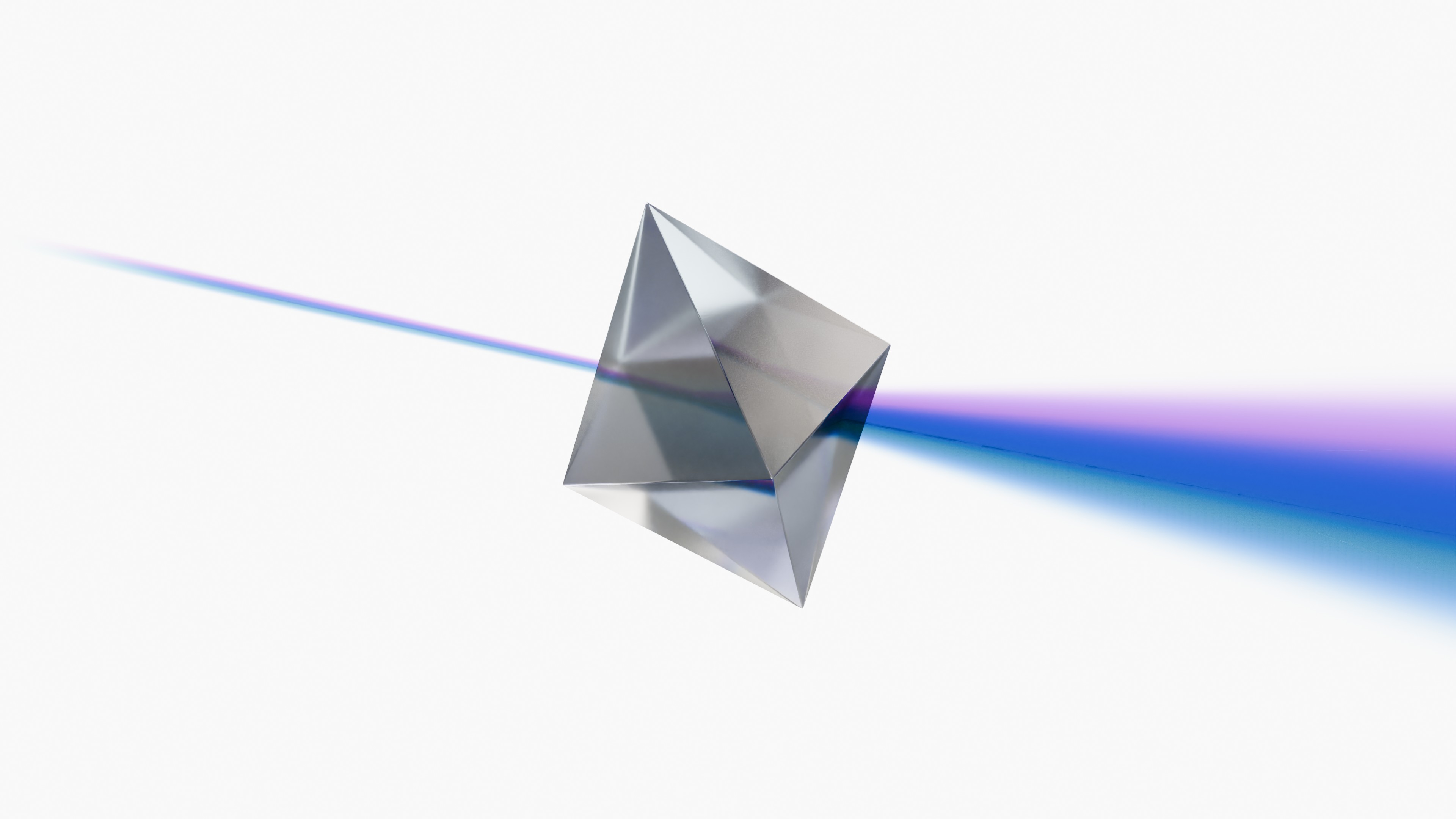 A glass octahedron transforms a narrow beam of light into a wider spectrum.